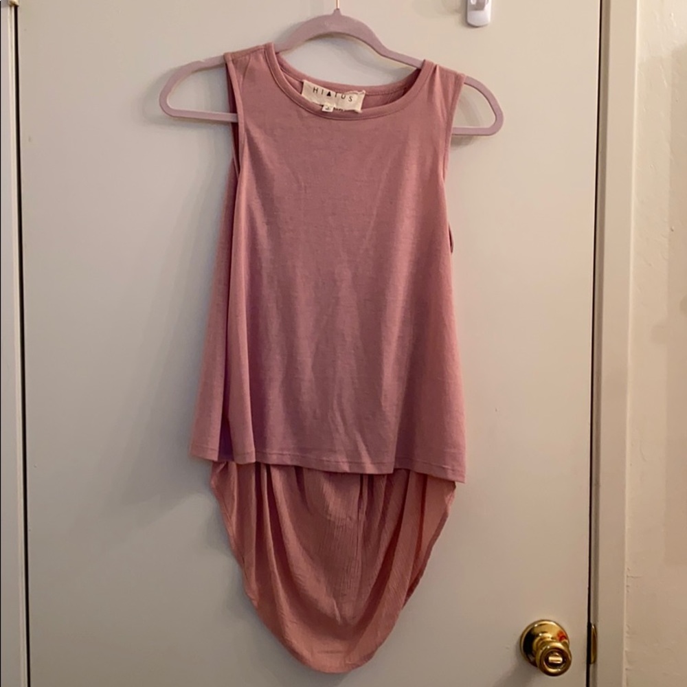Light pink tank with back cut out